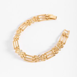 Pulsera en baño de oro con eslabones y piedras incrustadas